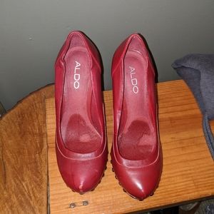 Red and black studded Aldo pumps